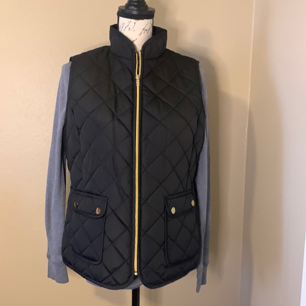 Black puffy vest